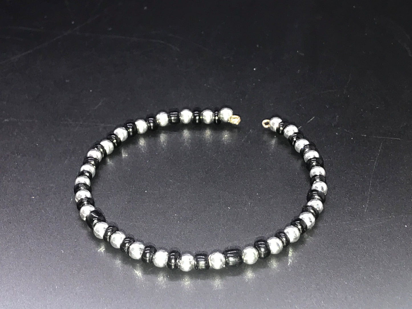 BKC = White & Black Bracelets