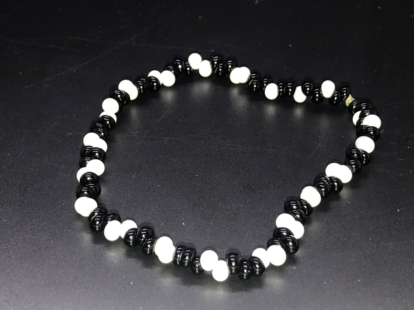 BKC = White & Black Bracelets