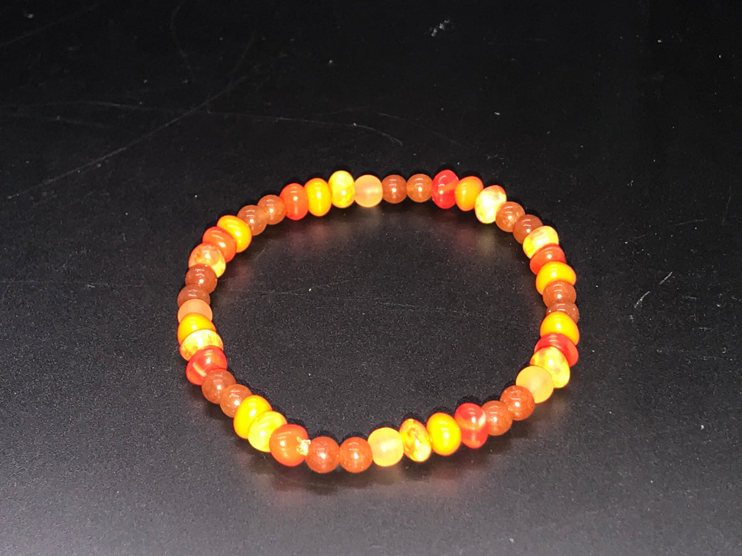 BKC - Orange Bracelets